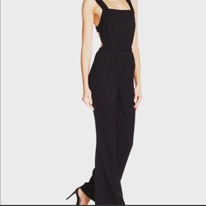 FAVLUX  Black open tie back jumpsuits. (Brand new)